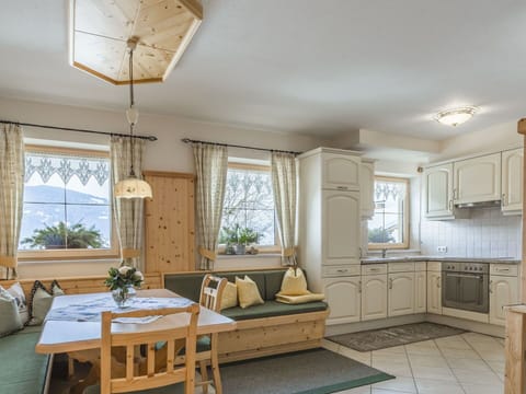 Furniture, Interior Design, Wood, Flooring, Ceiling, Floor, Room, Lighting, Home, Table