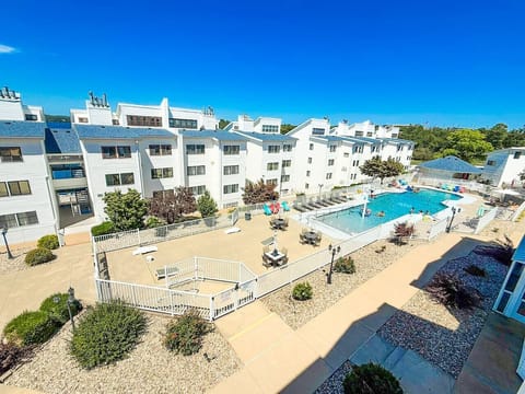 Soak in the views—relax with stunning sights of the lake and pool, all from the comfort of your condo.