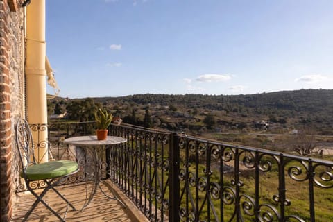 Private Balcony with Open Views over the Traditional Village and Surrounding Hills