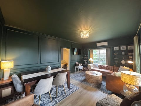 Enjoy your living and dining area, with TV, board games, a record player & more!
