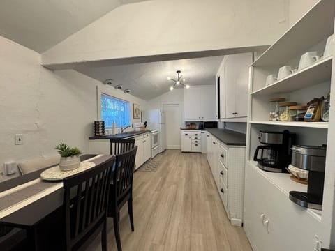 Your full kitchen with two dining areas: both indoor and outdoor dining options.