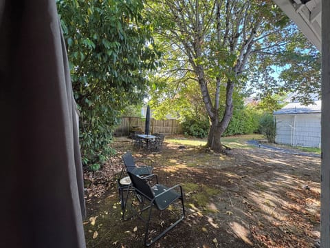 Private backyard oasis. Relax with coffee or wine in the shade.