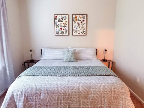 Cozy comfort awaits! 🛏️✨ Sink into relaxation with this serene bedding retreat.