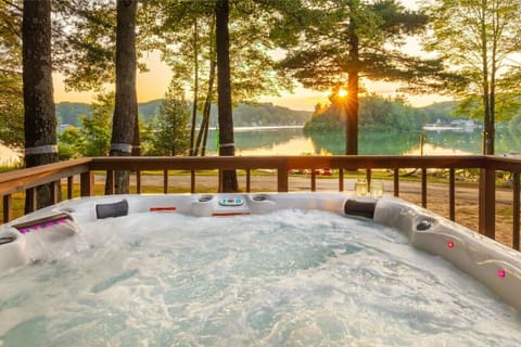 Outdoor hot tub overlooking the lake.