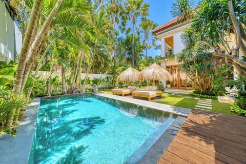 The perfect spot to relax and rejuvenate by the poolside in tropical luxury