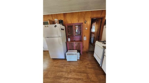 Kitchen has window AC unit installed