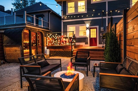 Indulge in the private sauna, gather around the cozy fire pit, and unwind under twinkling lights. This charming backyard is perfect for peaceful evenings, al fresco dining, and unforgettable nights under the stars.