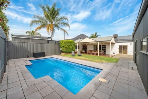 Take a refreshing dip in your private in-ground pool, fully fenced for your peace of mind.