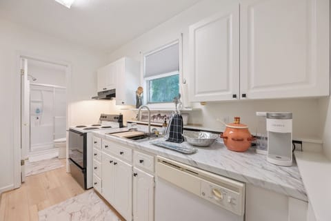 The sink has a glass rinser and a fruit and vegetable rinser. 