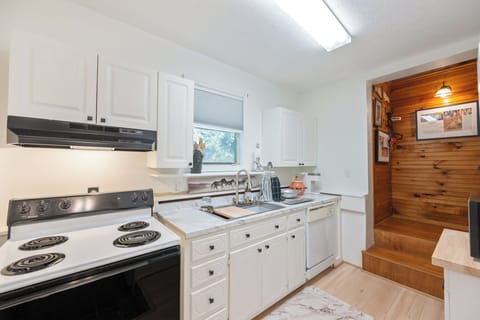 Kitchen has an electric range w/oven. 