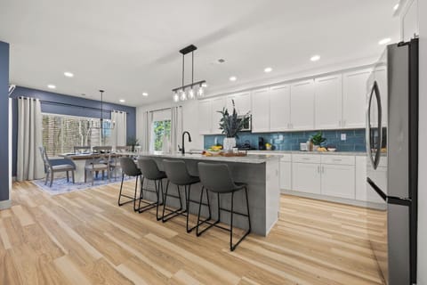 Relax in Style! 🛋️ Our spacious main living room offers plenty of seating, natural light, and a cozy ambiance—perfect for unwinding after a long day.