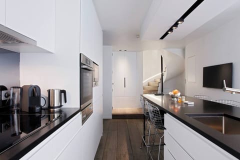 Enchanting Duplex, Kitchen-Diner - TV. Stairway to 1st floor.
