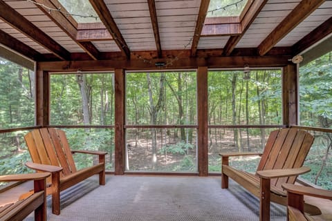 Take in the trees from your private screened-in retreat.