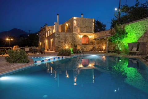 Villa exterior at night