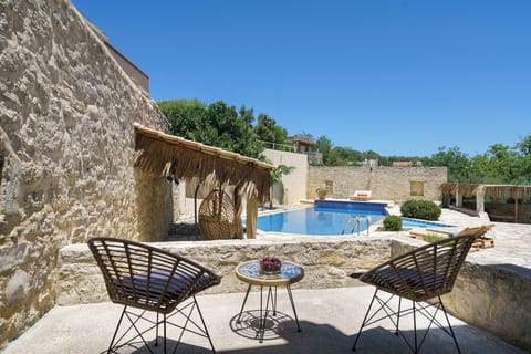 Balcony in apartment with pool view.