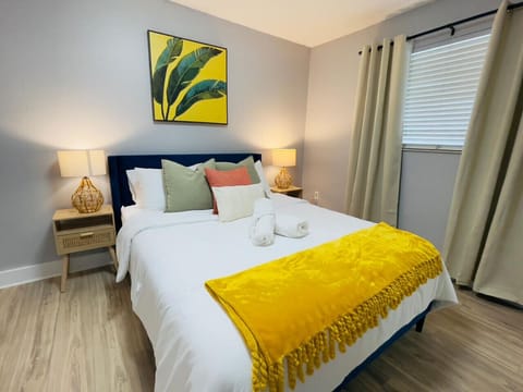 Queen comfort meets Miami warmth with a pop of golden sunshine.