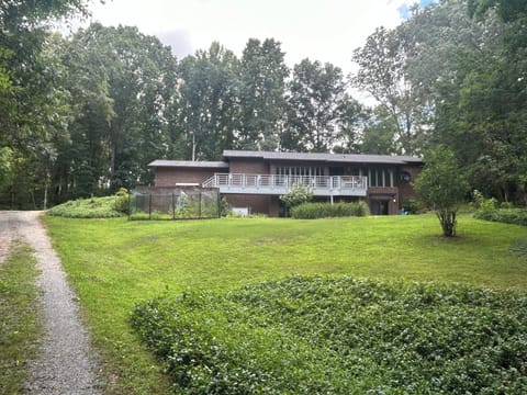 View of main residence. Entry to studio lower right corner. Parking upper left.