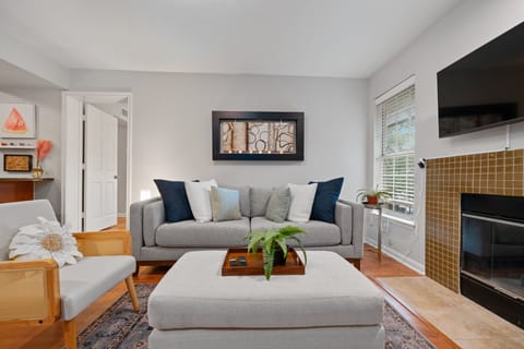 Living Room with flexible furniture to add seating. 