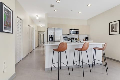 Kitchen Island has seating for 3