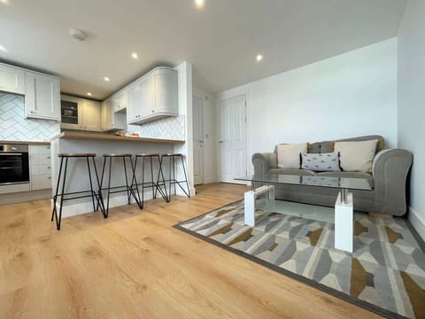 Open Plan Livingroom/ Kitchen with breakfast bar