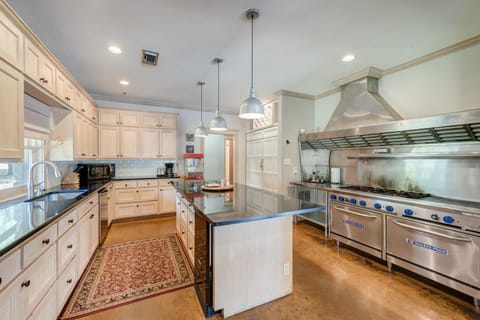 The Pool House kitchen has all you expect with an extra large fridge/freezer.