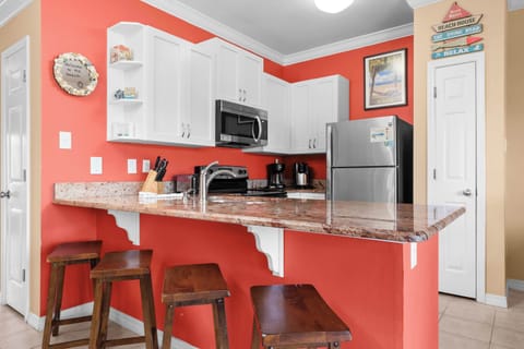 Additional counter seating at the full kitchen