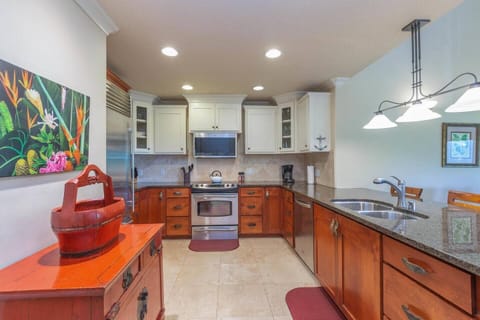Updated kitchen with granite counters and high end amenities
