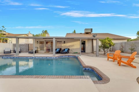 Soak up the sun and unwind poolside in your own private backyard oasis