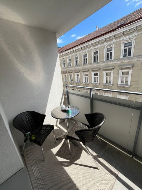 Enjoy your morning coffee or evening wine on this private balcony.