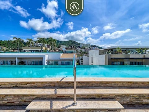 Rooftop infinity pool with panoramic ocean and city views in Puerto Vallarta's Romantic Zone