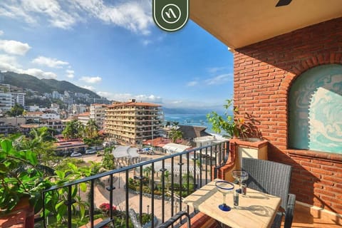 Enjoy your morning coffee or evening drink while taking in stunning ocean and city views from the private balcony.