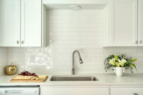 Cook and create in a kitchen filled with natural light, making meal prep a delight.