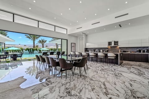 European cabinetry, Miele appliances, and a sleek modern aesthetic.