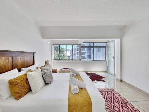 Main bedroom with comfy bed and good quality linen