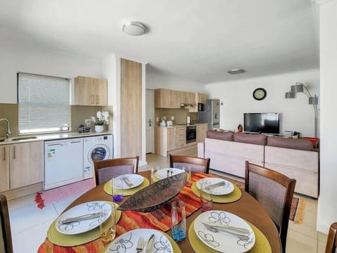 Dining area, leading to the kitchen and living room