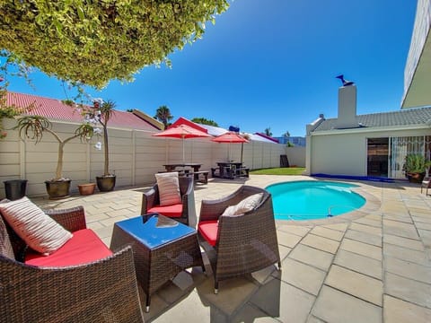 Pool area with outdoor seating