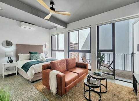 Open plan studio living with private balcony