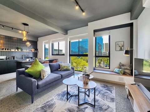 Open plan living room leading to the kitchen