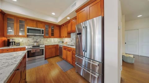 Modern kitchen with high-end appliances—your culinary playground in paradise