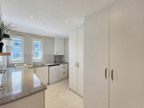 Scullery off the kitchen with washing machine