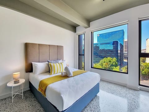 Light, airy bedroom with tons of natural sunlight and a comfy bed with great linen