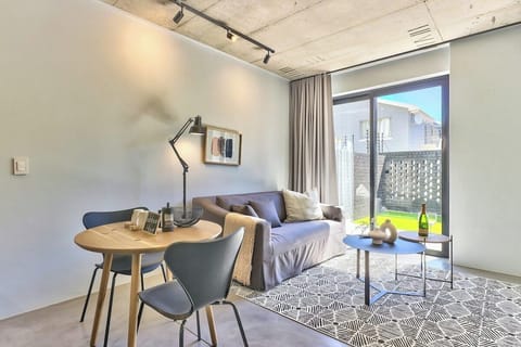 Open plan living room with small courtyard