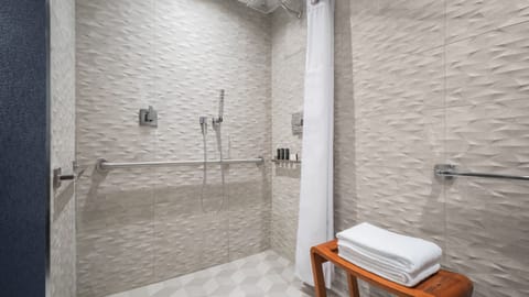 Rinse off easily in a spacious, modern walk-in shower.