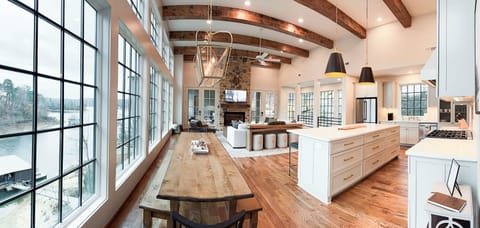 The dining area just off the kitchen and living area comfortably seats 10+.
