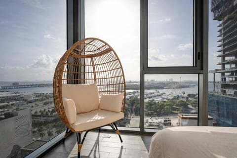 Spectacular breathtaking views of the Bay and Miami Ferris Wheel and Port of Miami Cruise Ships. 