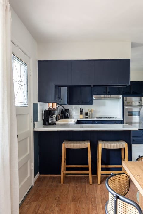Fully equipped kitchen stocked with cookware and essentials. Ready for everything from quick bites to full meals.