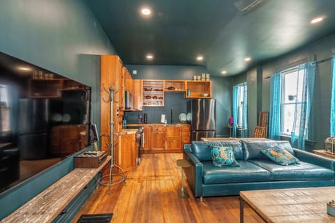 Curl up in the chic living room & stream your favorites on the smart TV​