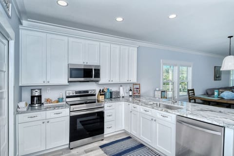 Spacious, fully equipped kitchen with everything needed for home-cooked meals