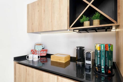 Coffee station with kettle, Nespresso machine, Nespresso capsules, and several tea options for you to enjoy during your stay.