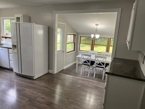 Full size refrigerator Dining Room Table with extra chairs